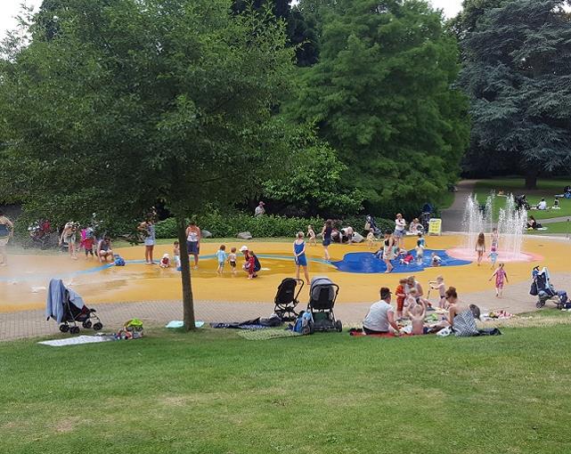 Worcester splashpad surrounded by sand with grass in foreground