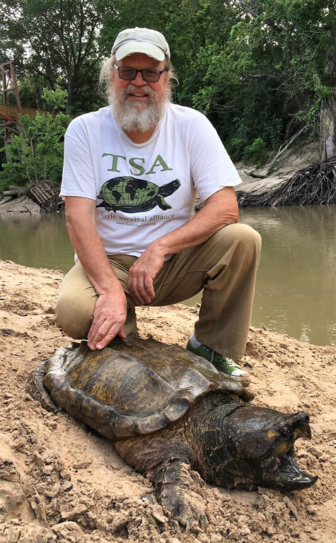 George Heinrich with an Alligator Snapping Turtle. (Photo: Jordan Gray)