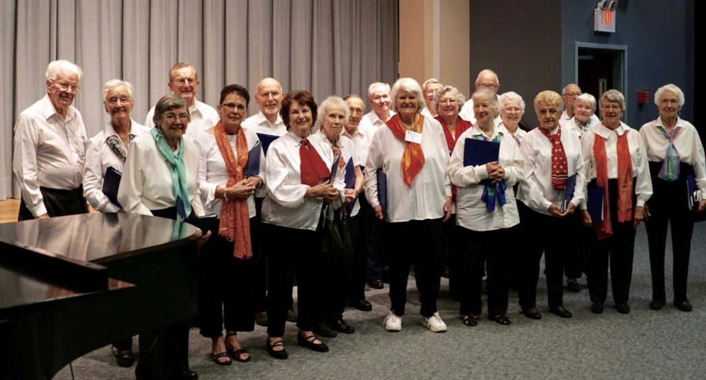 Twenty-two residents posing for Harry