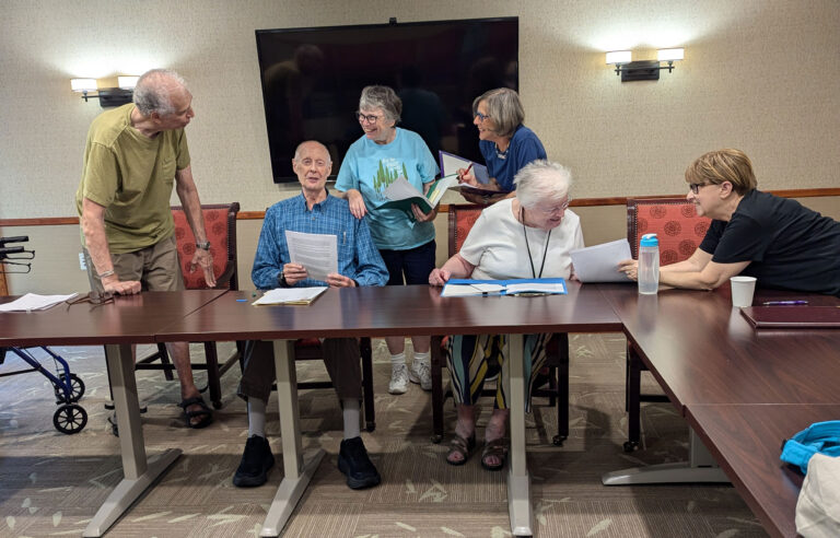 Members of the Writer' Roundtable discussing their work